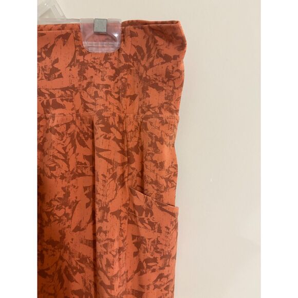 R.E.I Co-op leggings Peach colored geometric print pockets size Medium - Picture 2 of 5